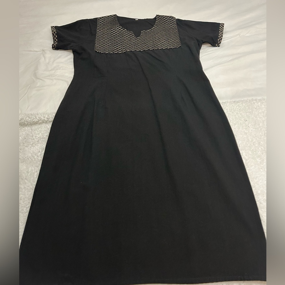 Black dress with embroidered details